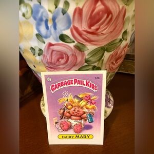Garbage Pail Kids Trading Card — Hairy Mary (Pink/Purple)